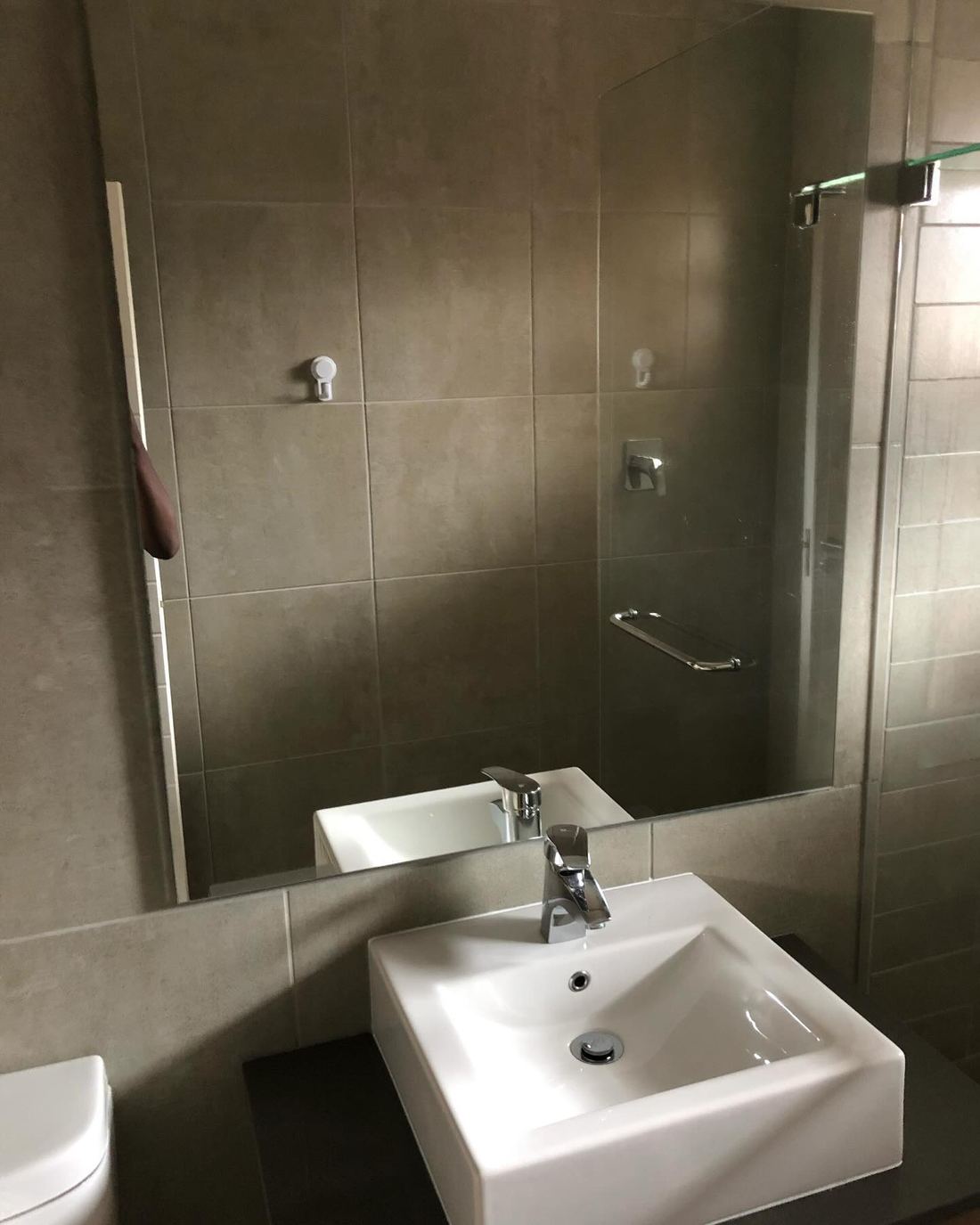 Post-Build Basin & Mirror — after cleaning by Dynamic Express Consultants