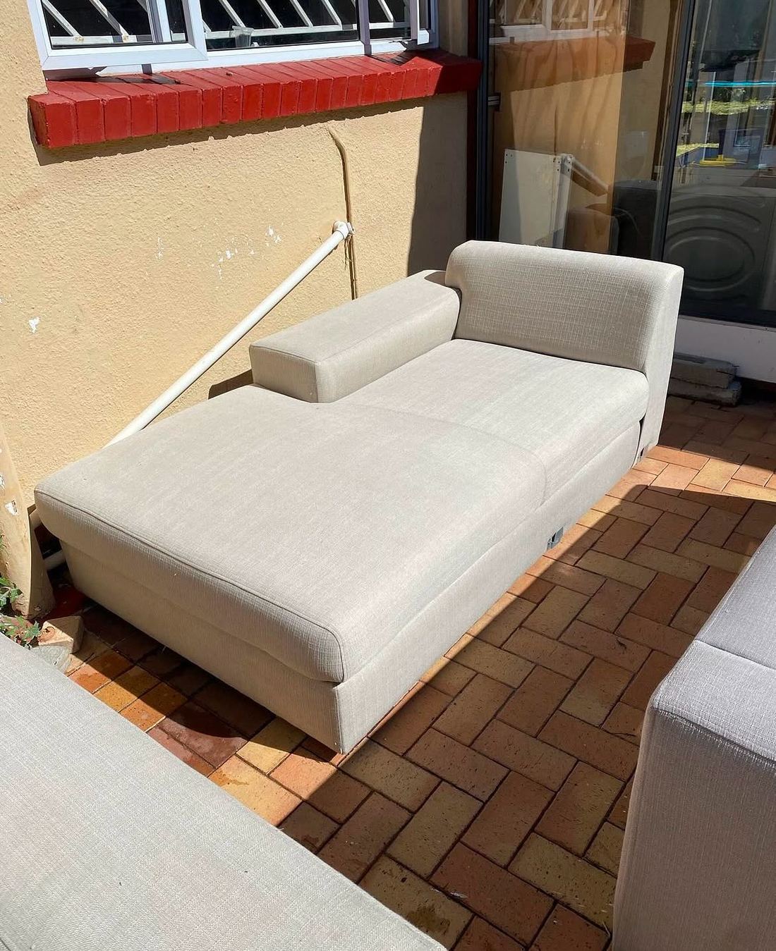 A cream corner suite after a professional upholstery deep-clean by Dynamic Express Consultants