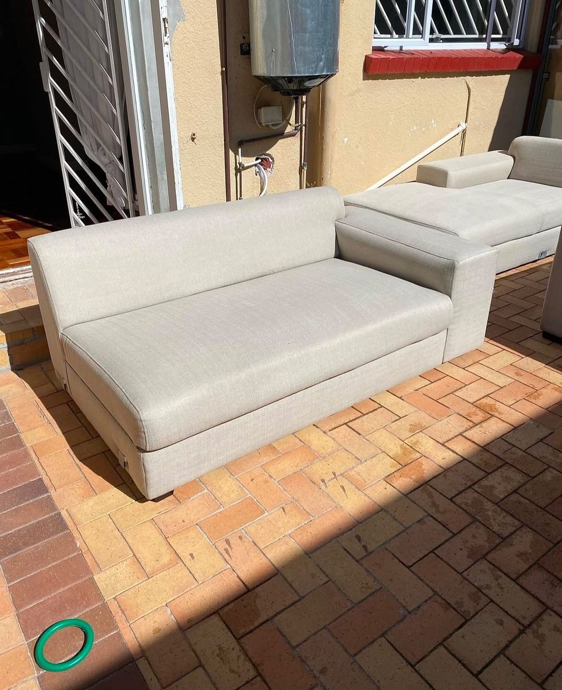 White Chaise Restoration — after cleaning by Dynamic Express Consultants