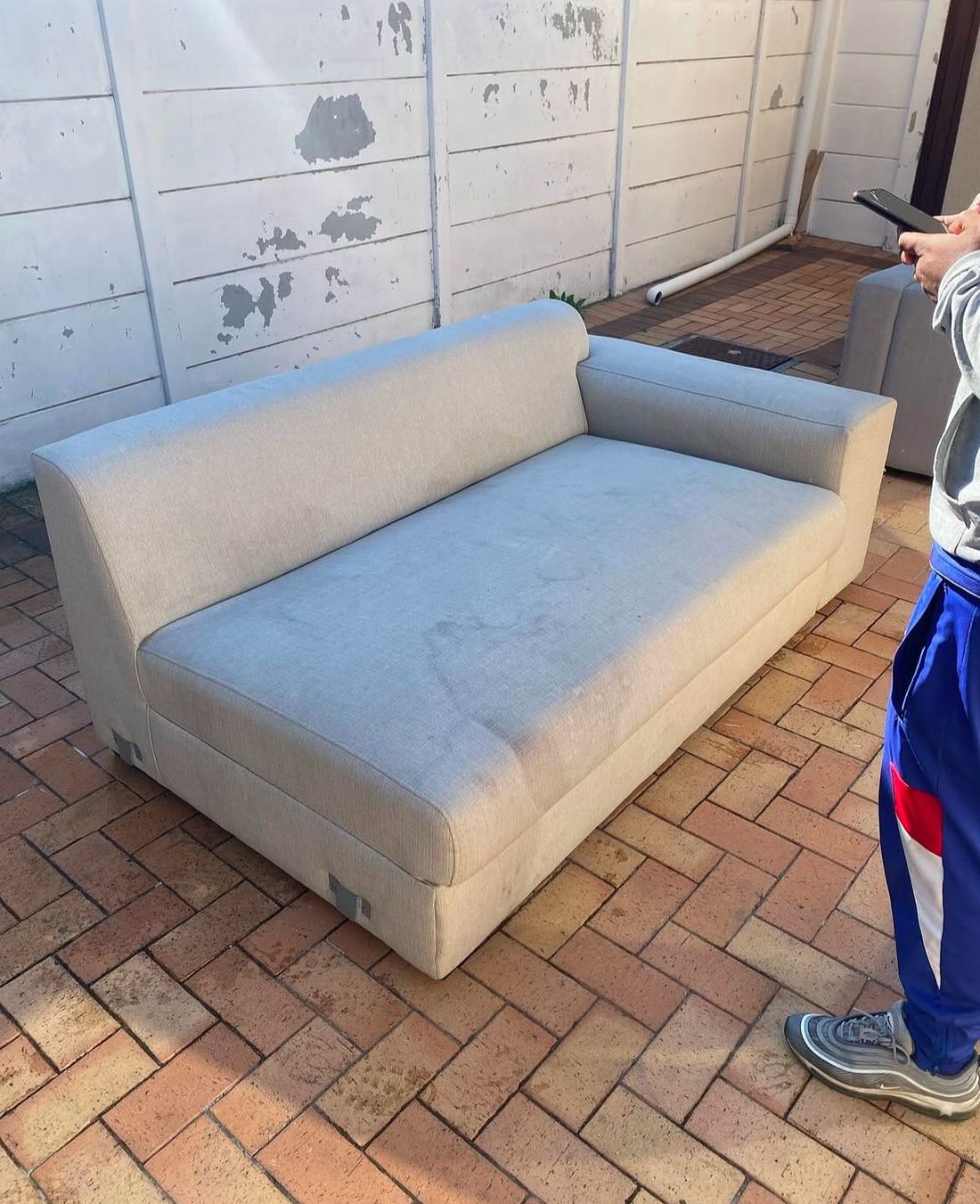 White Chaise Restoration — before Dynamic Express Consultants cleaned it